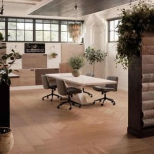 Modern office with conference table and chairs.
