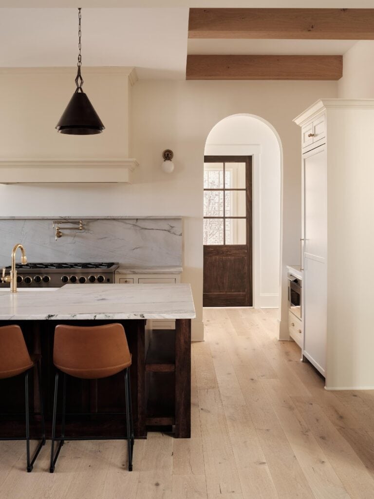 Modern kitchen with island and wooden flooring
