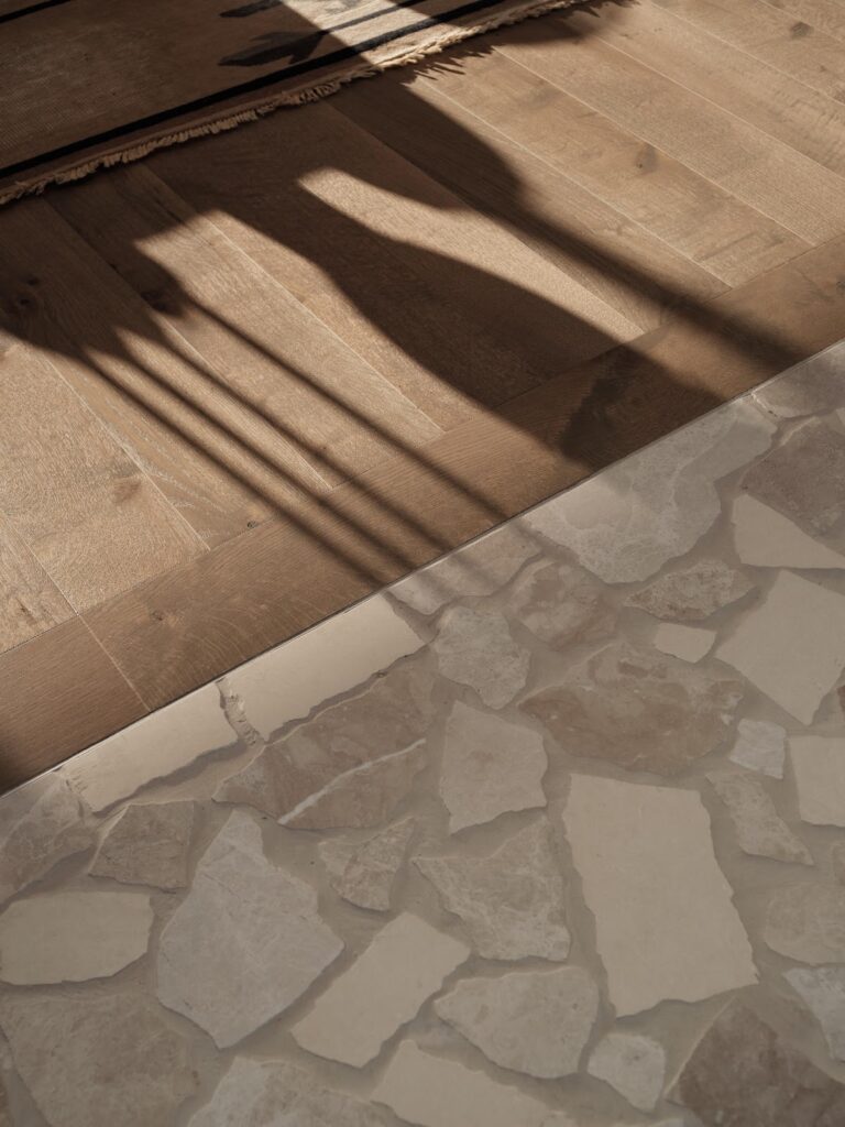 Wood and stone floor with shadows