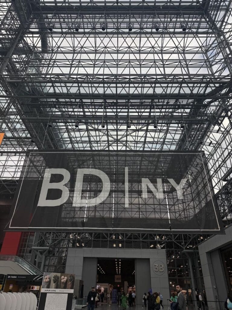 BDNY sign inside glass atrium structure, Javits Center.