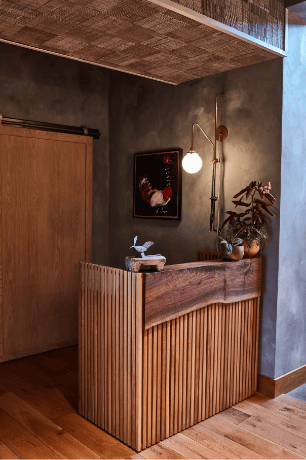 Cozy wooden reception desk with modern decor