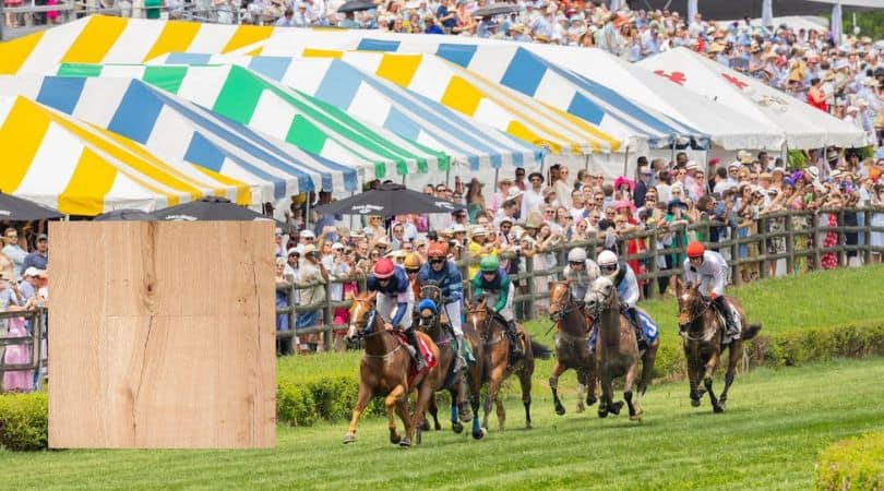 Horse race with jockeys and crowd under tents