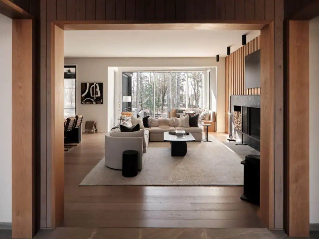 Modern living room with fireplace and large windows